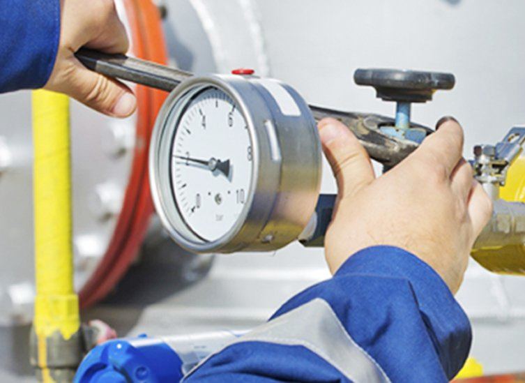 Gas Safe engineer inspecting commercial plant